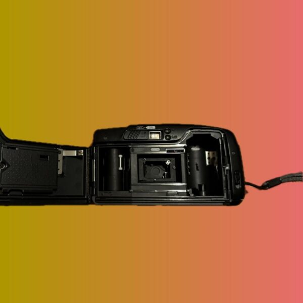 Ricoh FF-10 camera met originele polsriem, klaar voor gebruik.